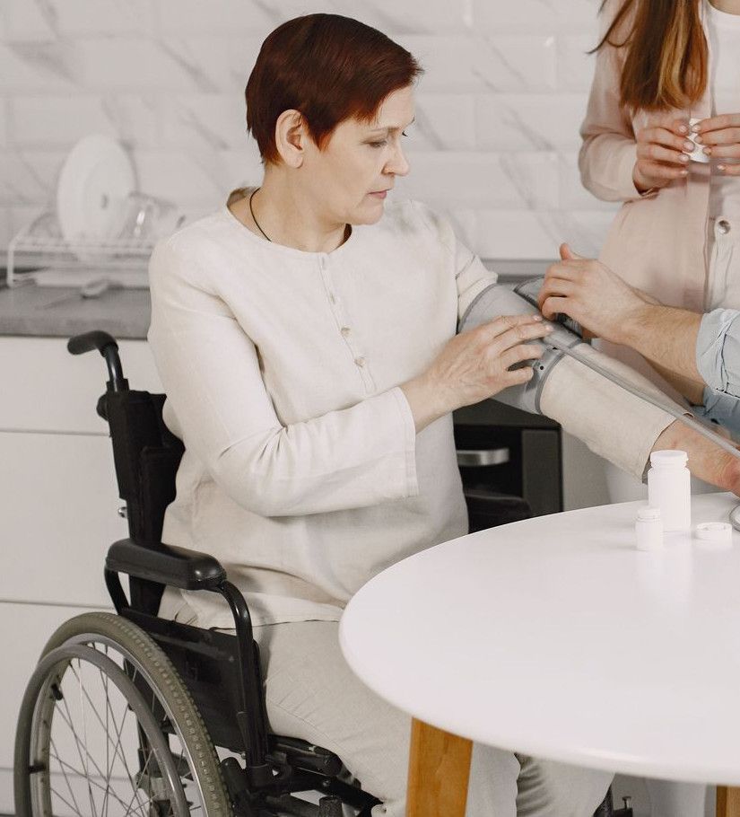 A family monitors blood pressure at home, ensuring health and wellness.